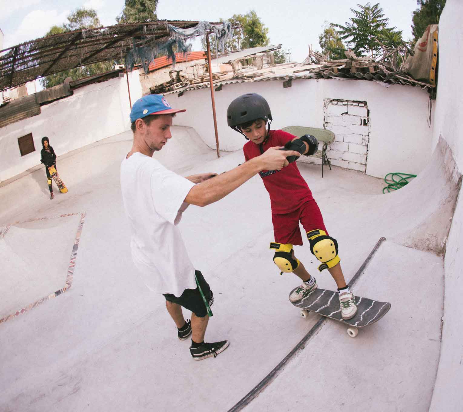 Teaching child skateboarding